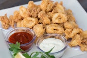 Order Fried Calamari food online from The Cheesecake Factory store, Columbus on bringmethat.com