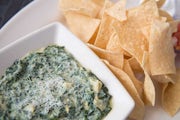 Order Hot Spinach and Cheese Dip food online from The Cheesecake Factory store, Columbus on bringmethat.com