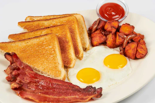 Farm Fresh Eggs* with Old Smokehouse® Bacon