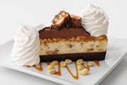 Order Chocolate Caramelicious Cheesecake Made with Snickers food online from The Cheesecake Factory store, Columbus on bringmethat.com