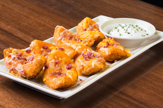 Order Outrageous Potato Skins food online from 99 store, Kingston on bringmethat.com
