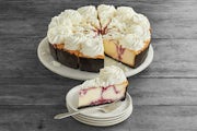 Order 10 Inch White Chocolate Raspberry Truffle food online from The Cheesecake Factory store, Columbus on bringmethat.com