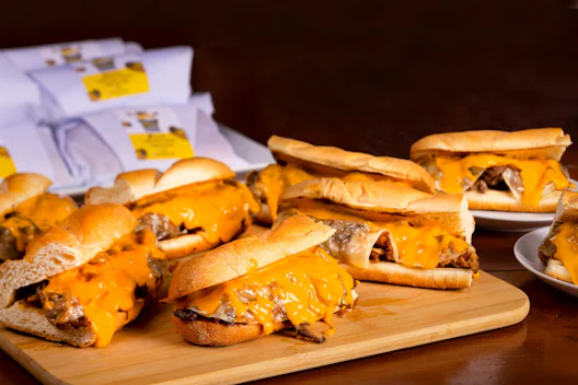 Deluxe Cheesesteak Box from the Bertucci's menu for Pardon My Cheesesteak