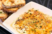 Order Warm Crab & Artichoke Dip food online from The Cheesecake Factory store, Columbus on bringmethat.com